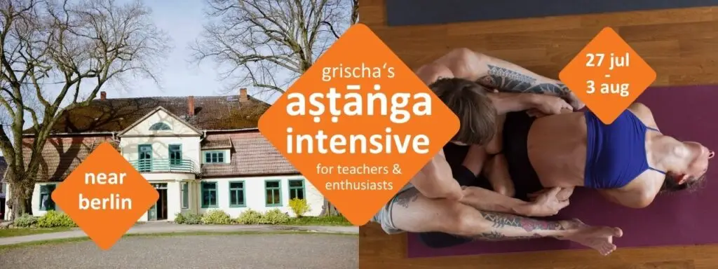 Yoga teacher adjusting a student in an Ashtanga retreat seminar house